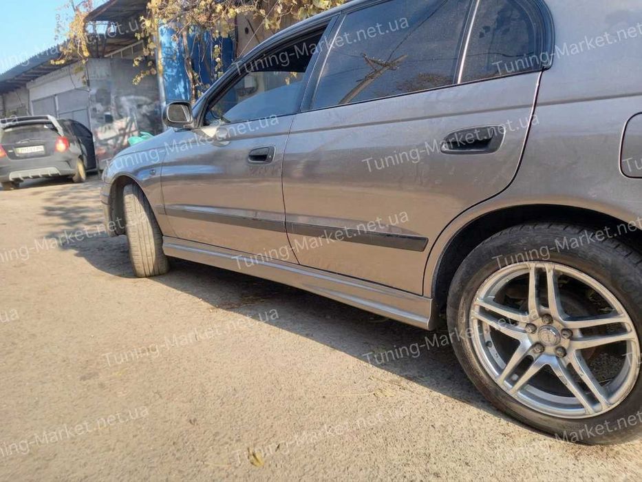 Накладка на передний бампер Toyota Carina E T190, накладки на пороги Тойота Карина Е