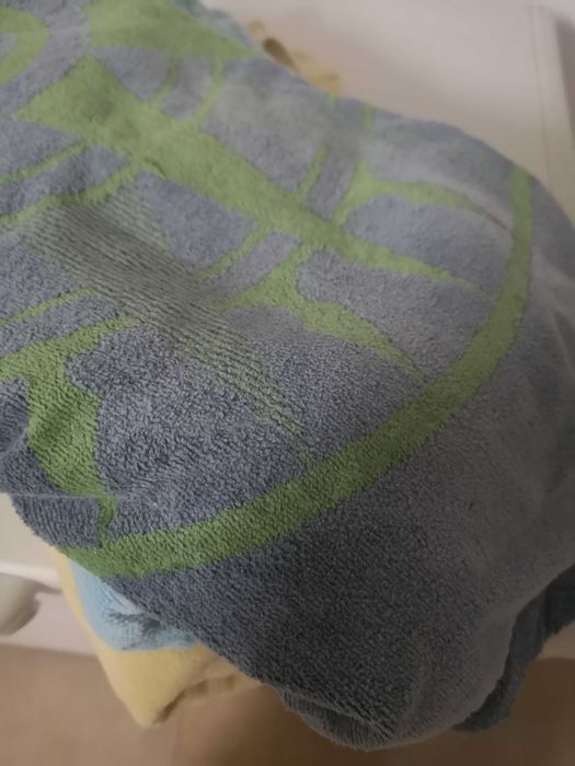 Toalhas de praia usadas