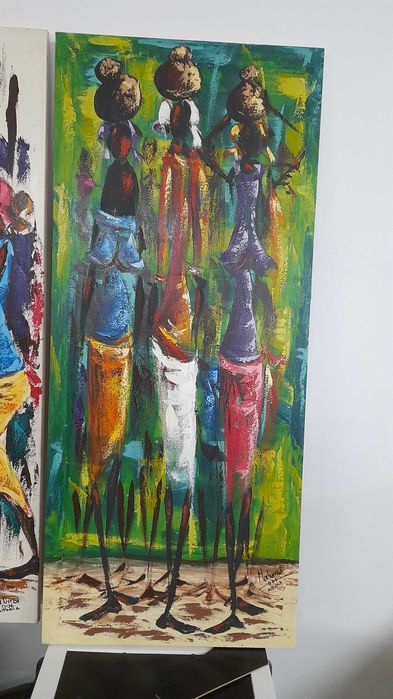 Quatro quadros pintados a mão