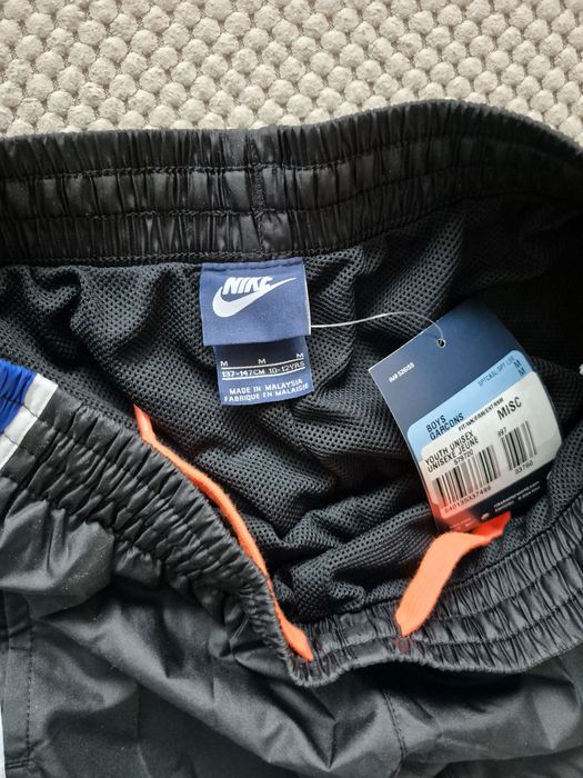 Nowe Spodnie Nike sportowe ortalionowe 137-147 M 10-12 YRS