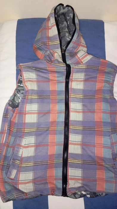 Colete reversível tamanho L em bom estado