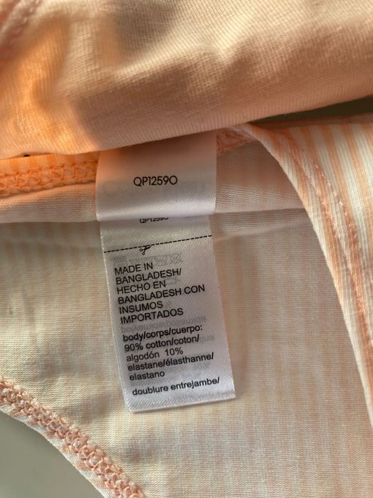 Majtki stringi Calvin Klein rozmiar  M 3 pak  
pomarańczowe