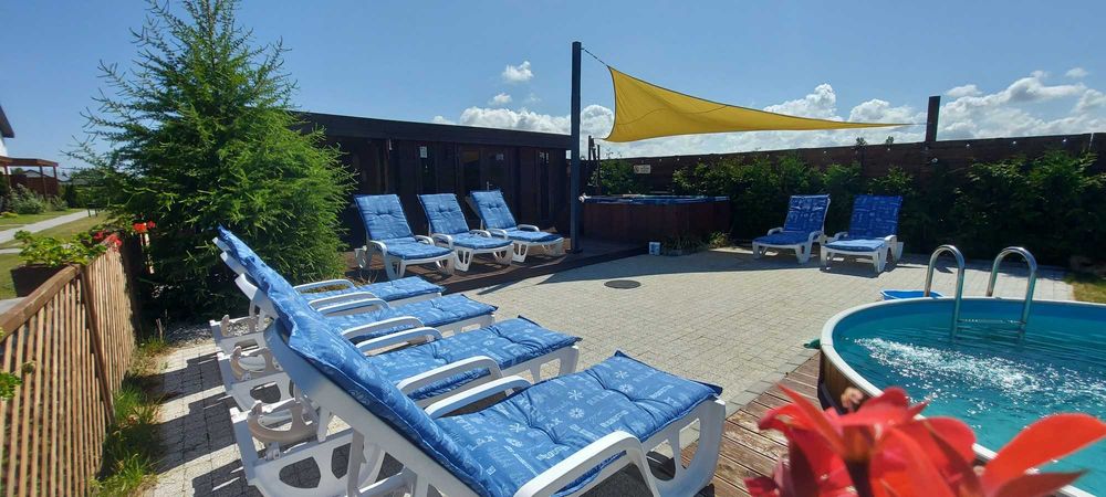 Domki w Łebie basen sauna jacuzzi WI-FI parking free CORDEN Village