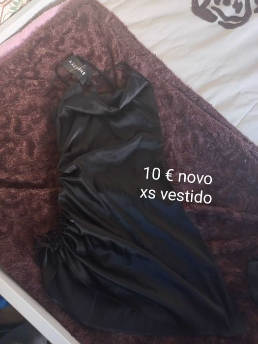 Roupa mulher e mala original  marca prada custa 1.200