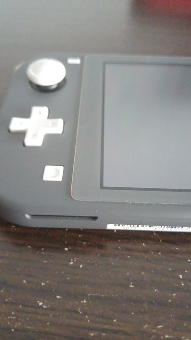 Nitendo Switch Lite com mala e proteção de vidro COMO NOVA!64284526000770123