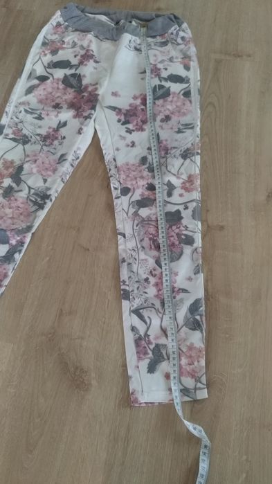 spodnie w kwiaty r.34