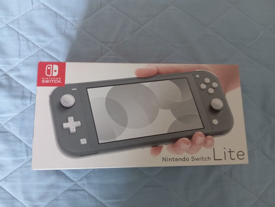 Vendo Nintendo Switch Lite Com 2 Jogos e Bolsa