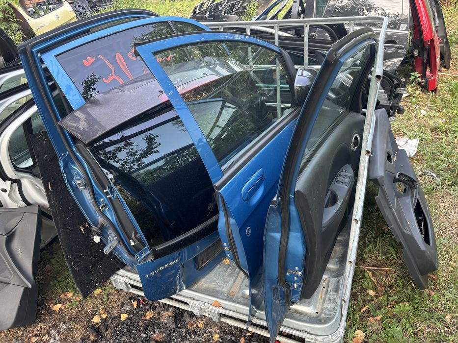 Двері Пежо ІОН Peugeot ION citroen c zero mitsubishi mev