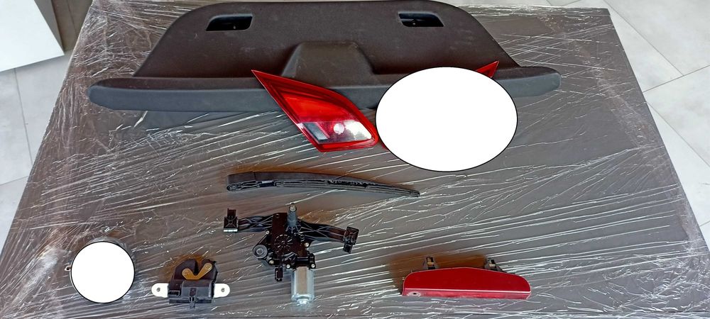 Lampa klapa tył,silniczek wycieraczki,stop,maska.Opel corsa e.5-drzwi.