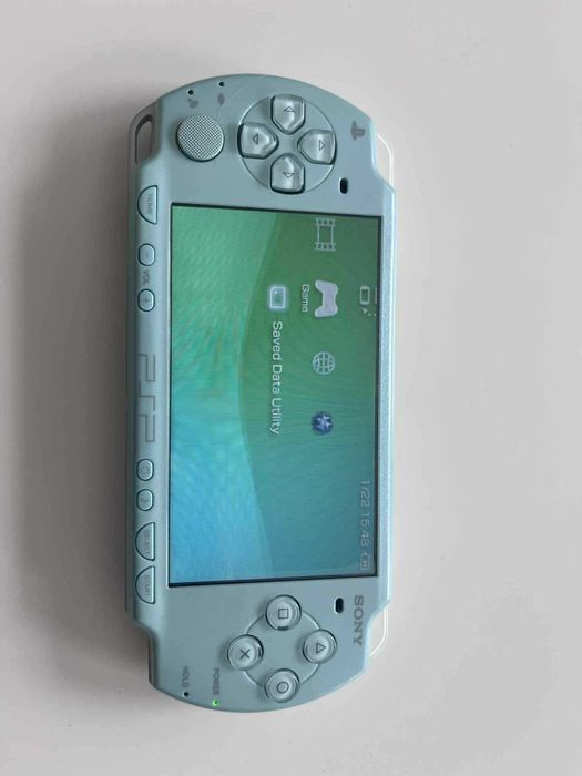 PSP 2000 Mint Green zielona, stan IDEALNY, org. ładowarka, adapter