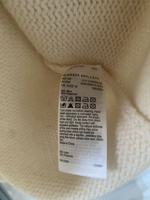 Wełniany sweter z wyciętymi ramionami Karen Millen M kremowy