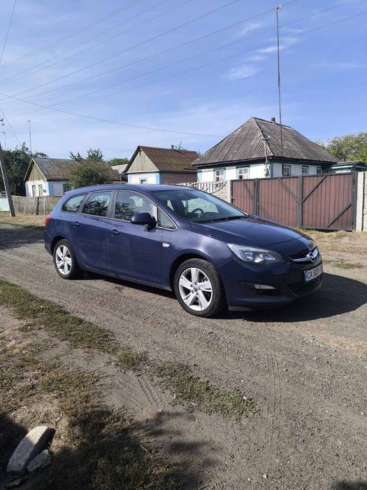 машина opel astra j 2014