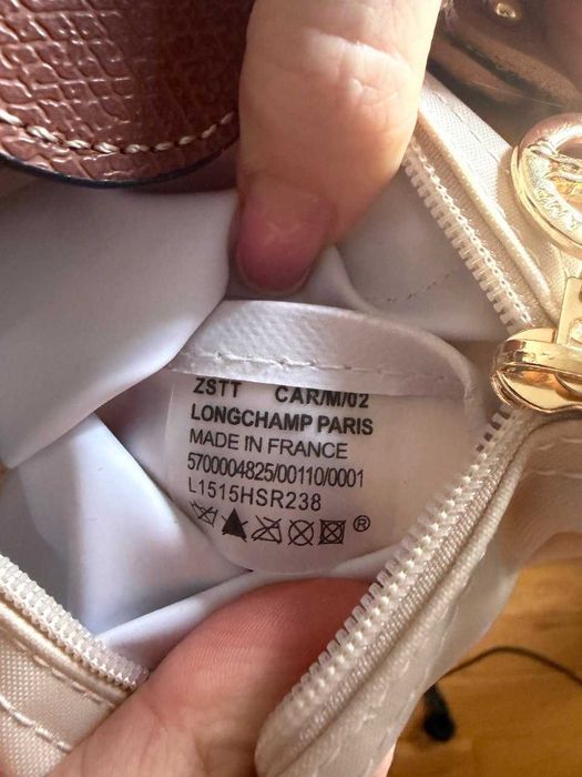 Bolsa Longchamp tamanho mini com alça em bege