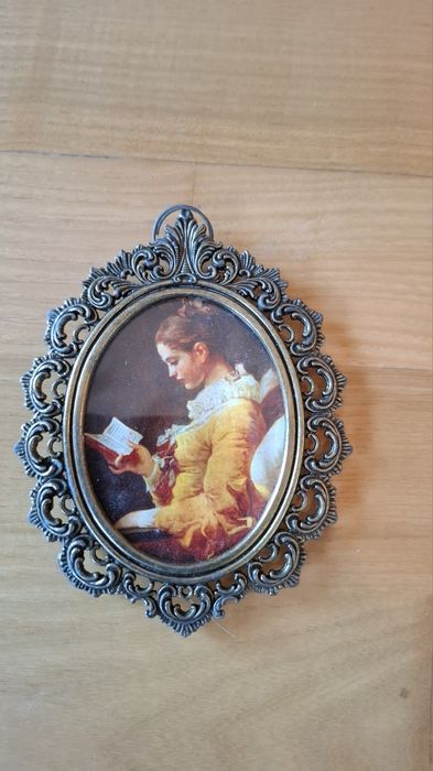 Portrety w ramkach z mosiądzu