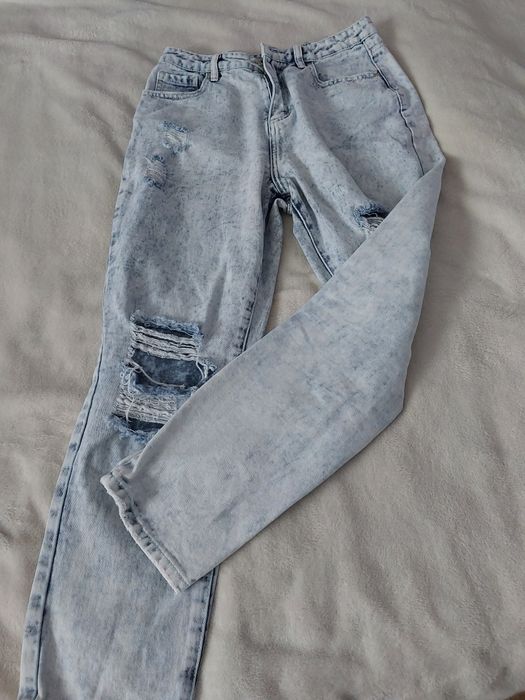 Spodnie jeansowe M x dziurami
