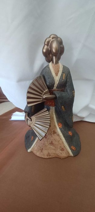 Estátua chinesa em barro