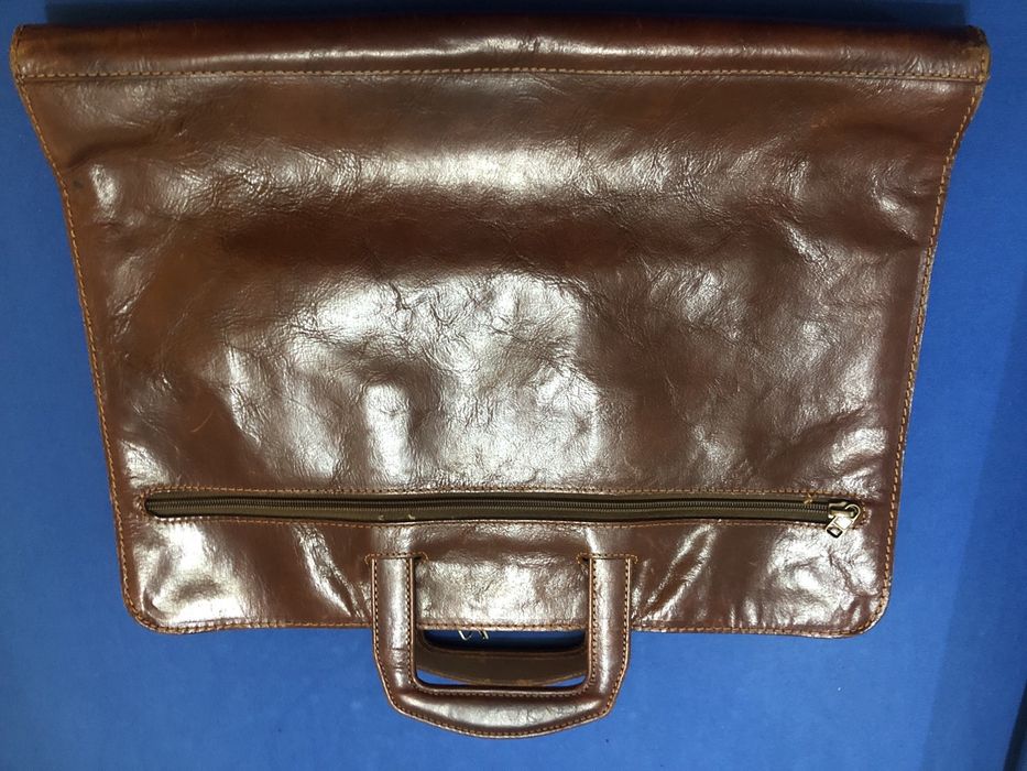 Mala em pele em bom estado  ou porta talblet