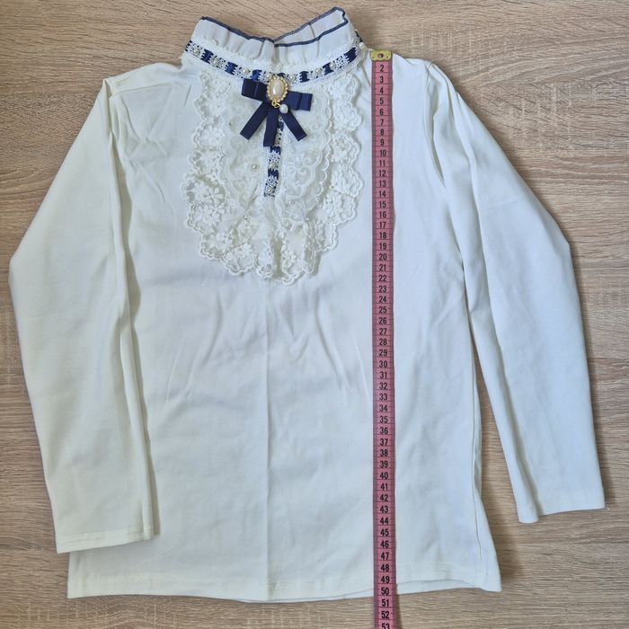 Шкільні блузи на дівчинку