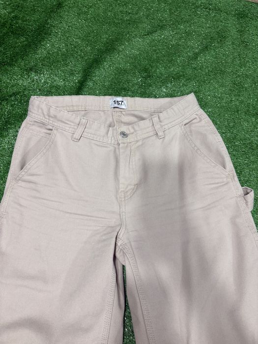 Облягаючі втягуючі кльош штани