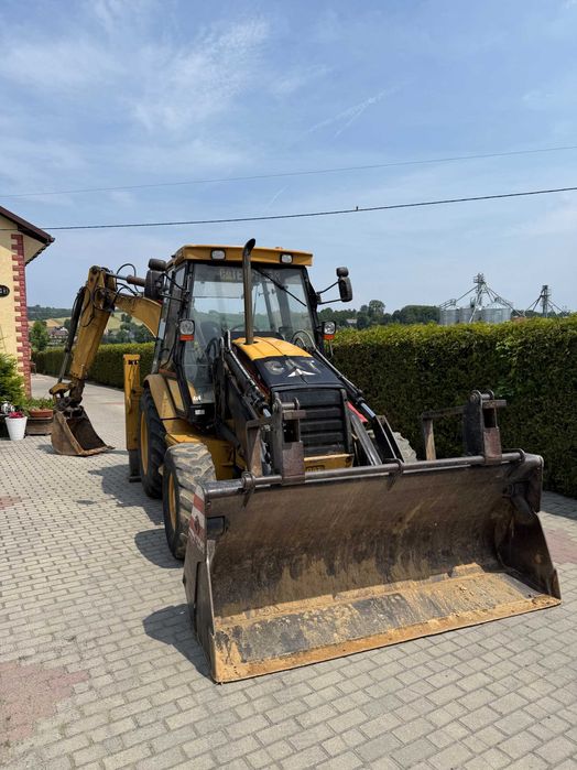 SPRZEDAM koparko-ładowarke CAT 428C