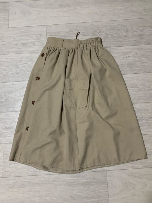 Довга спідниця з кишенями