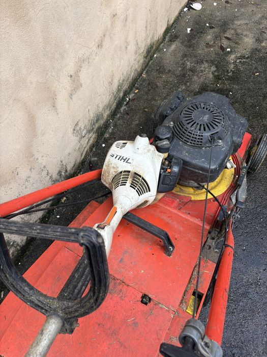 Maquina da relva Wolf e aparador stihl