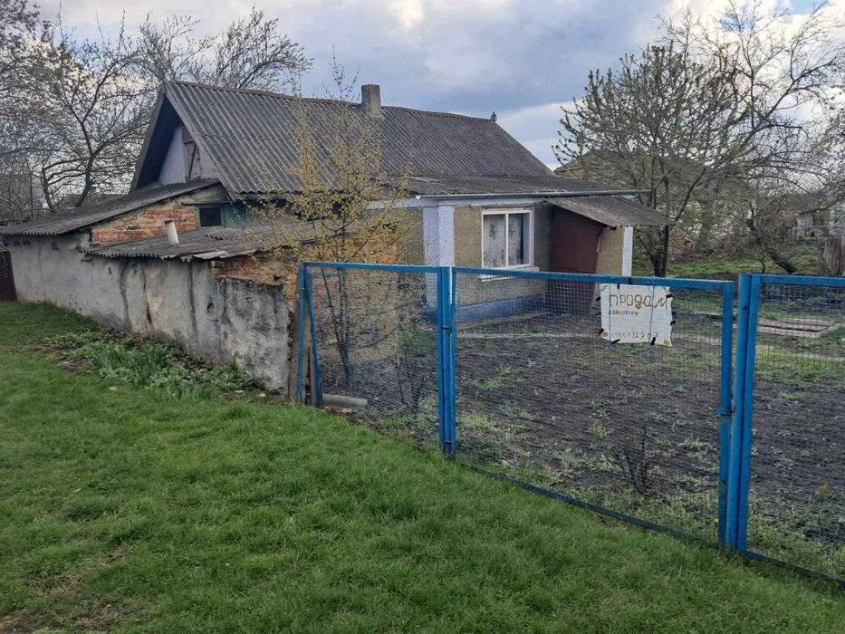 Продам половину будинку  + літня кухня (2 кімнати)