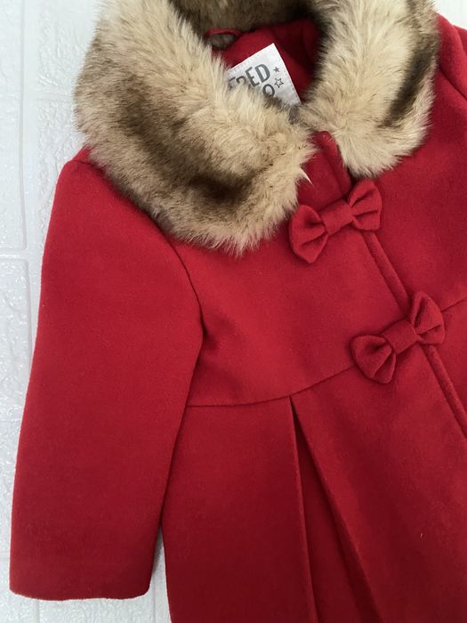 Стильне пальто.