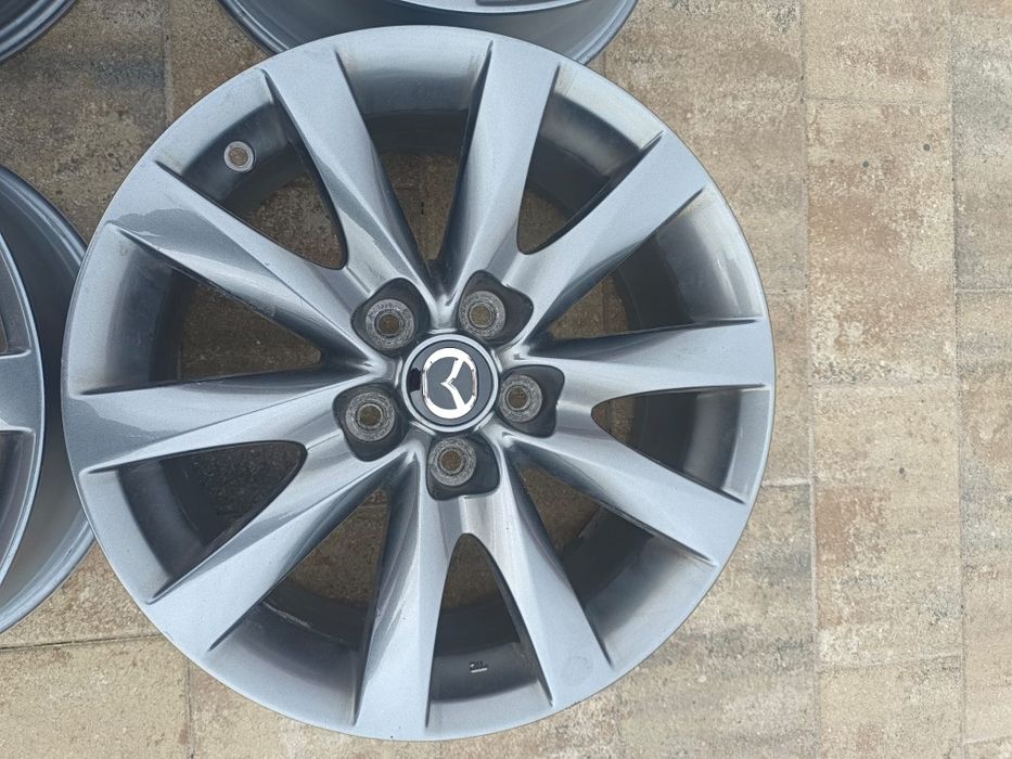Oryginalne felgi aluminiowe Mazda, R17 5x114.3, ET 50, dekielki