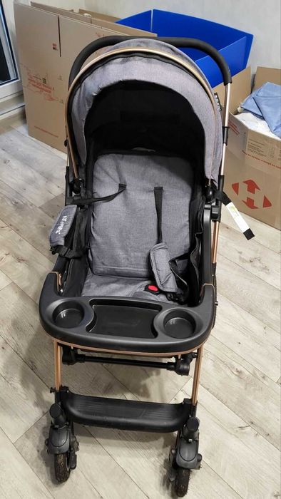 Нова  коляска  NINOS MAXI GREY сірого кольору  в повному комплекті