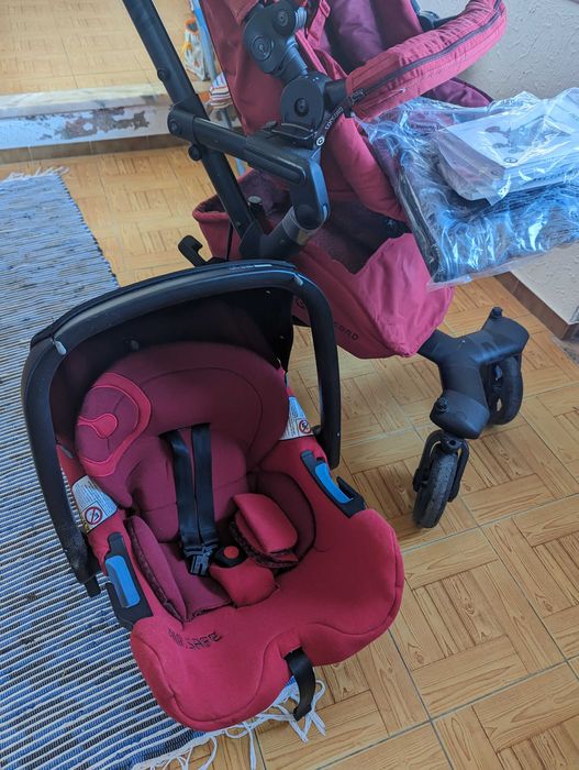 Ovo e carro  e isofix da Concord vermelho