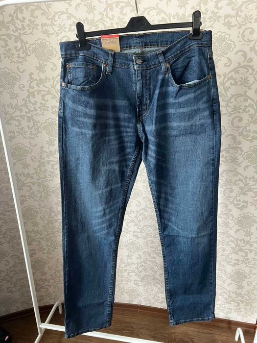 джинси нові Levis 559 L33 W34