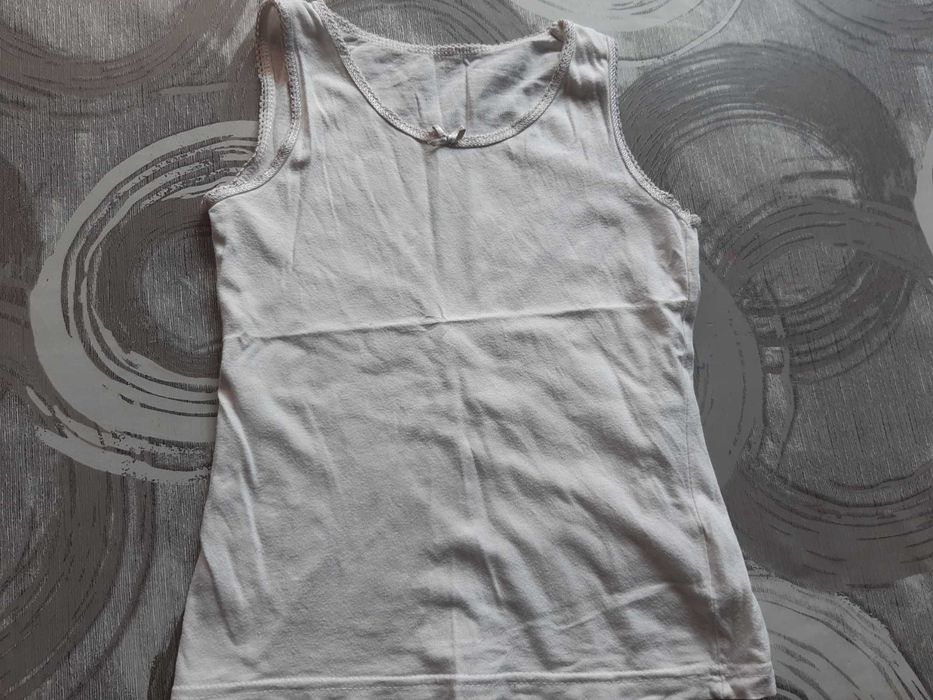 podkoszulka r. 110 / 116 biała t-shirt bez rękawów dziewczynka
