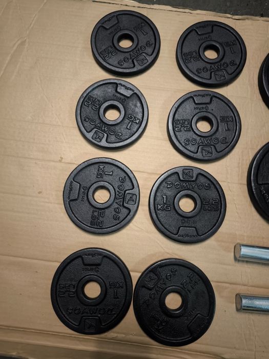 2 halteres com 12 anilhas como novos