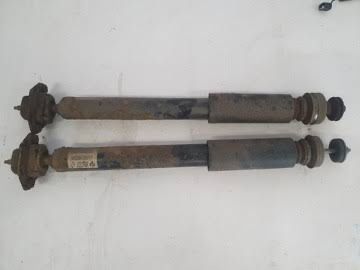 Задній амортизатор BMW X1 e83