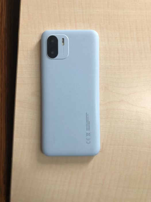 Redmi A2 com algumas marcas de uso