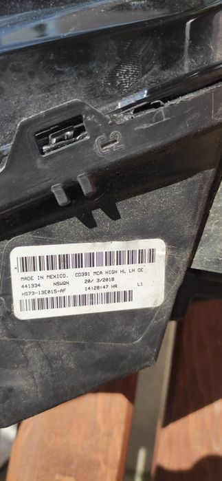 Lewa lampa Ford Fusion HS73-13E015-AF uszkodzona