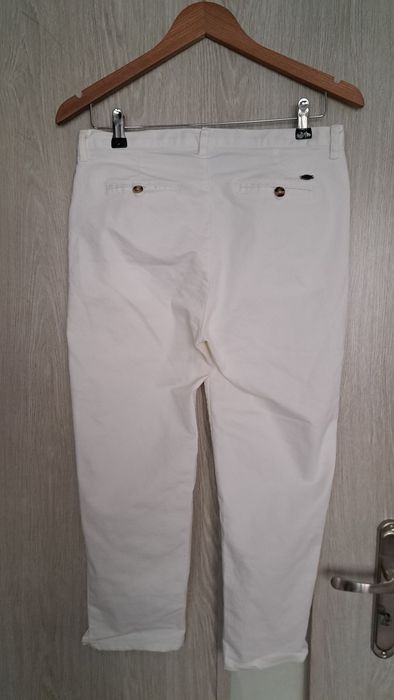 Biale spodnie materiałowe jeansy L 7/8 do kostki