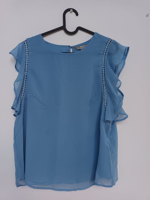 Blusa azul como nova