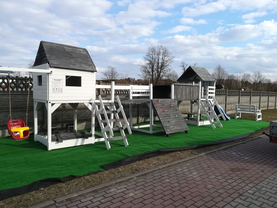 Plac zabaw huśtawka bocianie gniazdo stolik domek mostek transport