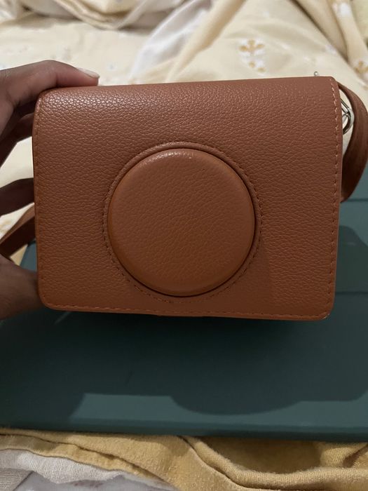 Compra de uma câmara instax mini evo