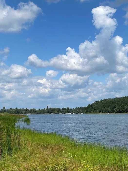 Продам 23 сот. с.Забір´я 2-га лінія від озера, всі комунікації ,  хата