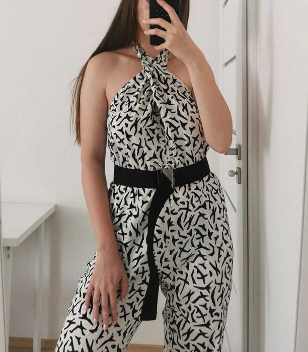 Czarno biały elegancki kombinezon bez pleców M 38 L 40 wiązany na szyi