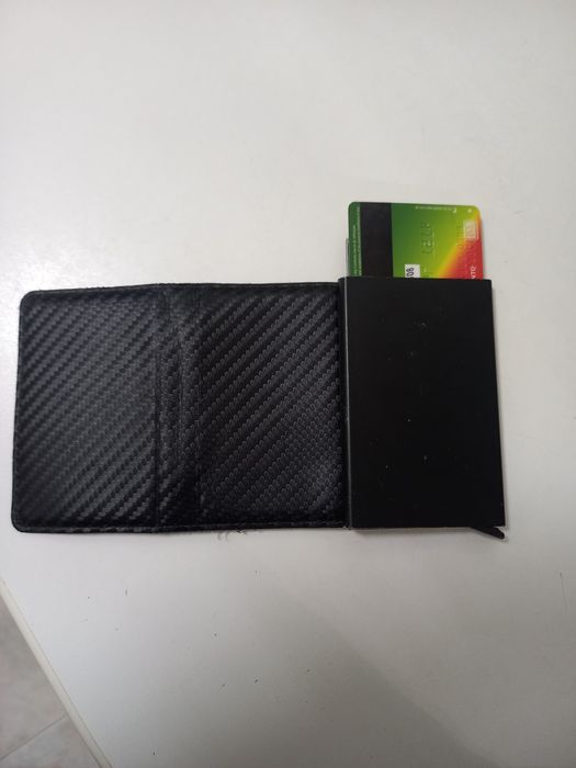 Carteira de homem preta usada em muito bom estado