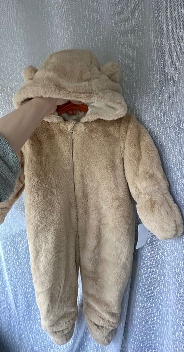 Новий теплющий комбінезон