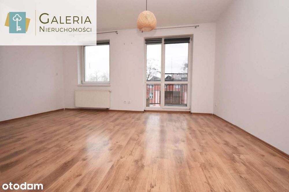 Trzy pokoje, balkon, miejsce postojowe