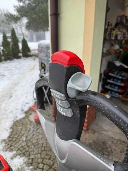 Still EXU 20 wózek widłowy paleciak z podestem 24V