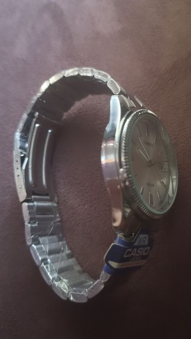Relógio Casio MTP-1302 - cinza e branco