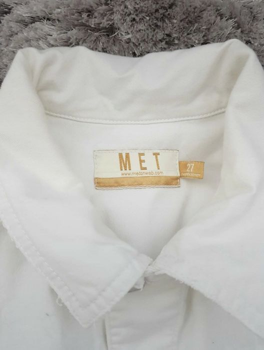 Macacão de jeans da marca Met