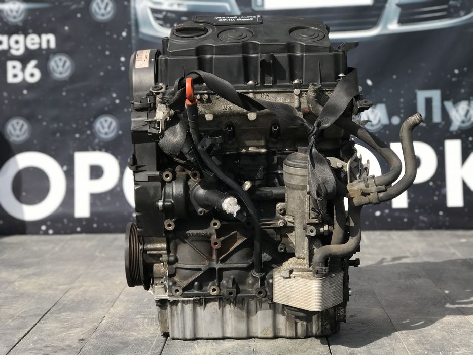 мотор двигатель 1.9 bls 77kw passat b6 golf 5 skoda a5 touran caddy